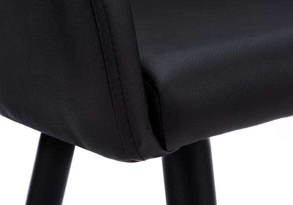 HomeRoots Set of Two Stylish Black Faux Leather Dining Arm Chairs – Comfortable, Versatile Seating for Any Space 490321