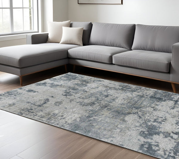 HomeRoots 5' Blue Abstract Power Loom Area Rug - Stylish, Durable, and Stain-Resistant for Modern Homes 8' X 10' 490423