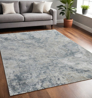 HomeRoots 5' X 8' Blue And Gray Abstract Area Rug - Stylish, Durable, Stain-Resistant for High-Traffic Homes 490431