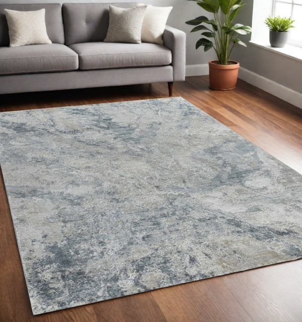 HomeRoots 5' X 8' Blue And Gray Abstract Area Rug - Stylish, Durable, Stain-Resistant for High-Traffic Homes 490431
