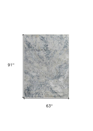 HomeRoots 5' X 8' Blue And Gray Abstract Area Rug - Stylish, Durable, Stain-Resistant for High-Traffic Homes 490431