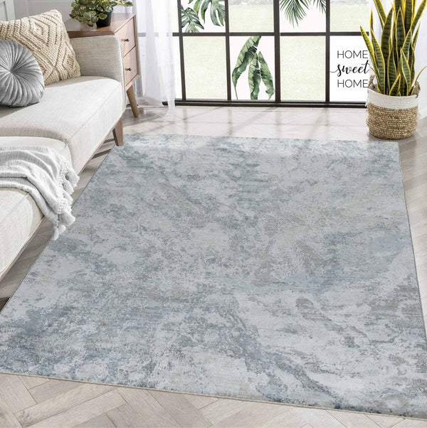 HomeRoots 5' X 8' Blue And Gray Abstract Area Rug - Stylish, Durable, Stain-Resistant for High-Traffic Homes 490431