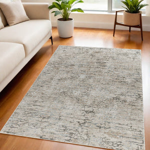 Homeroots 5' X 8' Beige Abstract Stain Resistant Area Rug  Other Material 490434