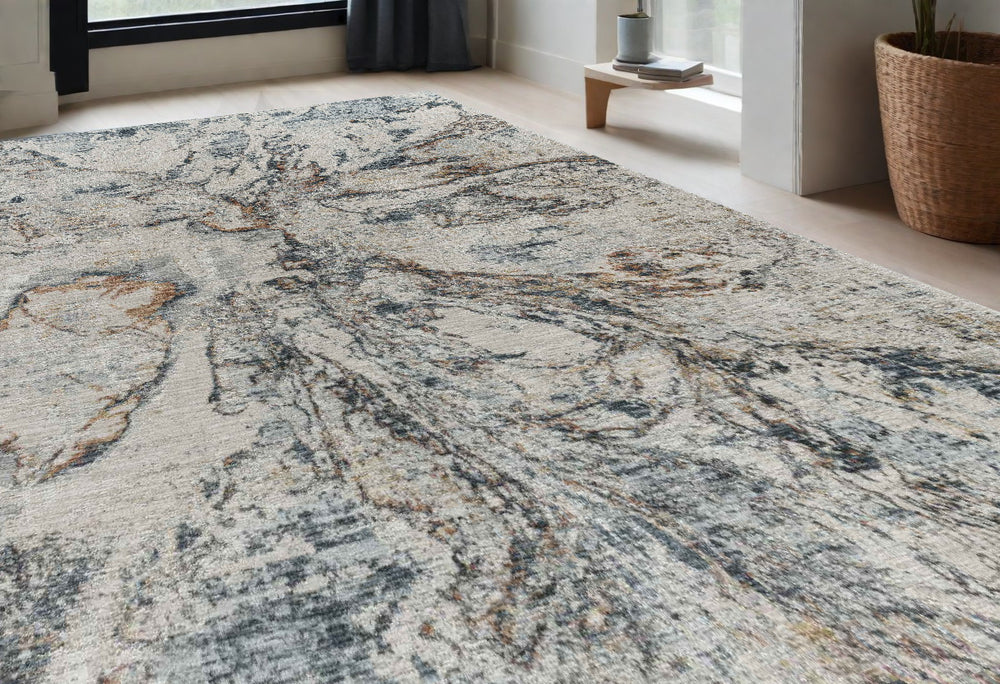 Homeroots 5' X 8' Beige And Blue Abstract Power Loom Area Rug  Other Material 490443