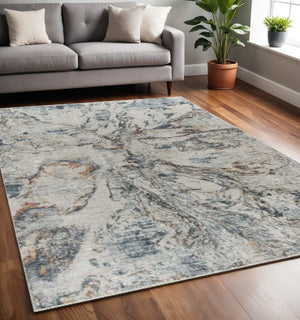 HomeRoots 5' Beige and Blue Abstract Area Rug - Modern Design, Durable, Stain-Resistant, Perfect for Any Space 5' X 8' 490443