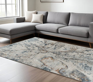 HomeRoots 5' Beige and Blue Abstract Area Rug - Modern Design, Durable, Stain-Resistant, Perfect for Any Space 9' X 12' 490445