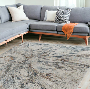 Homeroots 9' X 12' Beige Blue Abstract Power Loom Area Rug  Other Material 490445