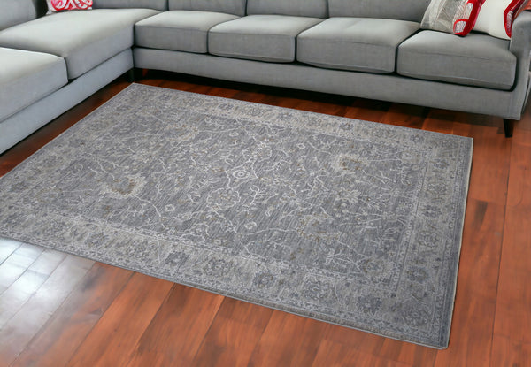 Homeroots 9' X 12' Blue Gray Southwestern Floral Stain Resistant Area Rug  Other Material 490454