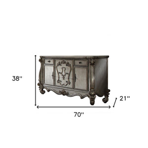 Homeroots 70" Regal Platinum Carved Scrollwork Dresser - Elegant Five Drawer Triple Storage Solution For Bedrooms  Manufactured Wood,Polyresin 490476