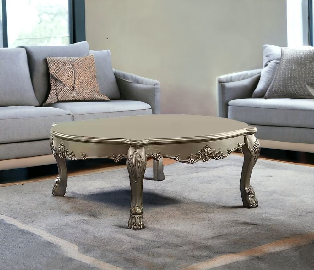 Homeroots 54" Gold And Bone Solid And Manufactured Wood Coffee Table   490543