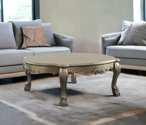 Homeroots 54" Gold And Bone Solid And Manufactured Wood Coffee Table   490543