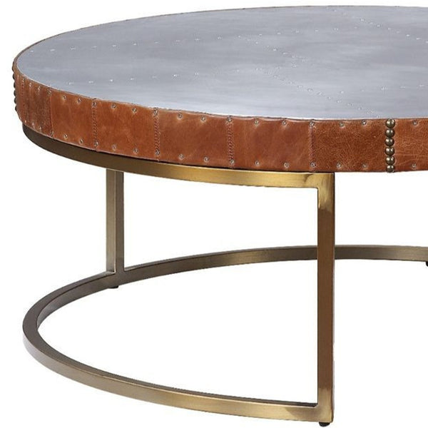 Homeroots 36" Brown And Silver Leather And Metal Round Coffee Table   490544