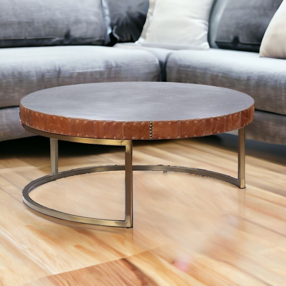 Homeroots 36" Brown And Silver Leather And Metal Round Coffee Table   490544