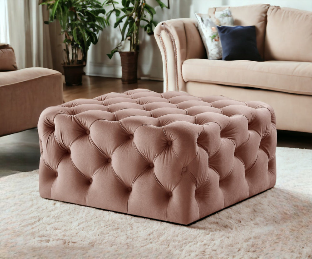 HomeRoots 33" Plush Rolling Tufted Cocktail Ottoman - Mid-Century Modern Design for Versatile Living Spaces Blush Velvet 490615
