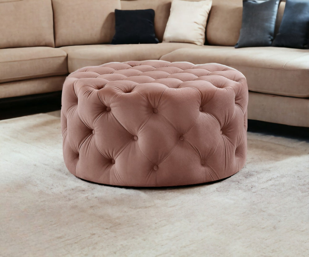 HomeRoots 33" Round Tufted Cocktail Ottoman with Wheels - Stylish Mid-Century Modern Seating for Any Space Blush Velvet 490621