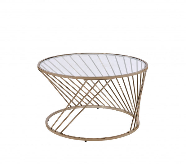 Homeroots 32" Champagne And Clear Glass And Metal Round Coffee Table   490741