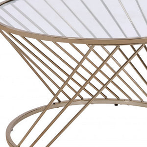 Homeroots 32" Champagne And Clear Glass And Metal Round Coffee Table   490741