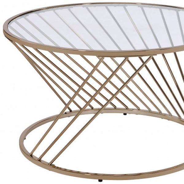 Homeroots 32" Champagne And Clear Glass And Metal Round Coffee Table   490741