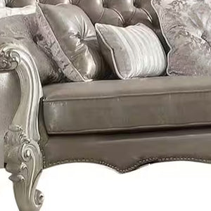 Homeroots 90" Gray Faux Leather Curved Sofa And Toss Pillows With Bone Legs   490989