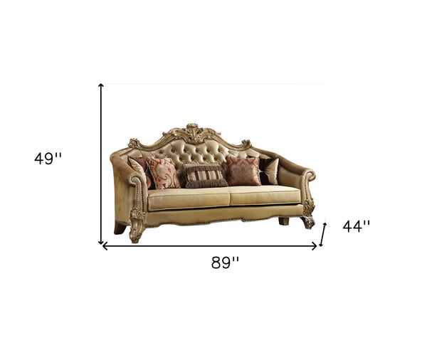 Homeroots 89" Bone Faux Leather Sofa And Toss Pillows With Gold Legs   490995