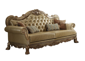 HomeRoots 85" Bone Faux Leather Sofa with Toss Pillows - Elegant Carved Design, Comfortable Seating for 3 490997