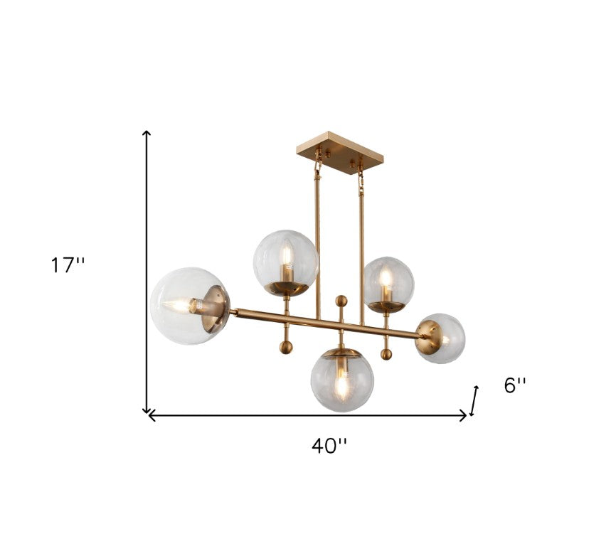 HomeRoots Brass Five Light Island Chandelier with Transparent Glass Shades for Modern Kitchens 491092