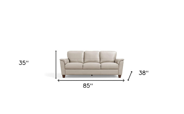 Homeroots 85" Beige Leather Sofa With Black Legs   491298