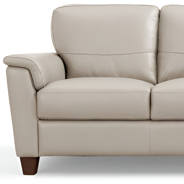 Homeroots 85" Beige Leather Sofa With Black Legs   491298