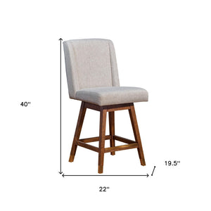 HomeRoots 26" Taupe Swivel Bar Chair with Brown Solid Wood Base - Stylish Comfort for Home Bars & Kitchens 491371
