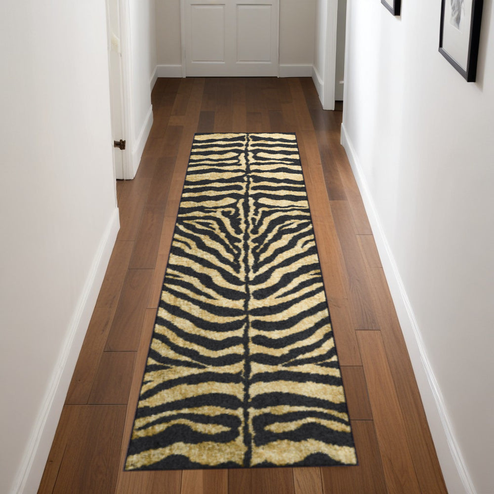 Homeroots 3' X 8' Black And Gold Animal Print Shag Handmade Non Skid Runner Rug  Polyester 491632