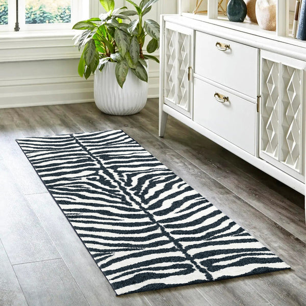 Homeroots 3' X 8' Black And White Zebra Print Shag Handmade Non Skid Runner Rug  Polyester 491638