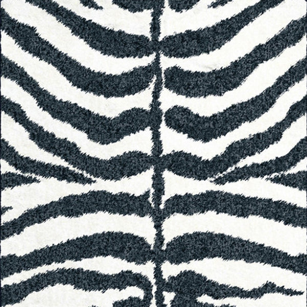 Homeroots 3' X 8' Black And White Zebra Print Shag Handmade Non Skid Runner Rug  Polyester 491638