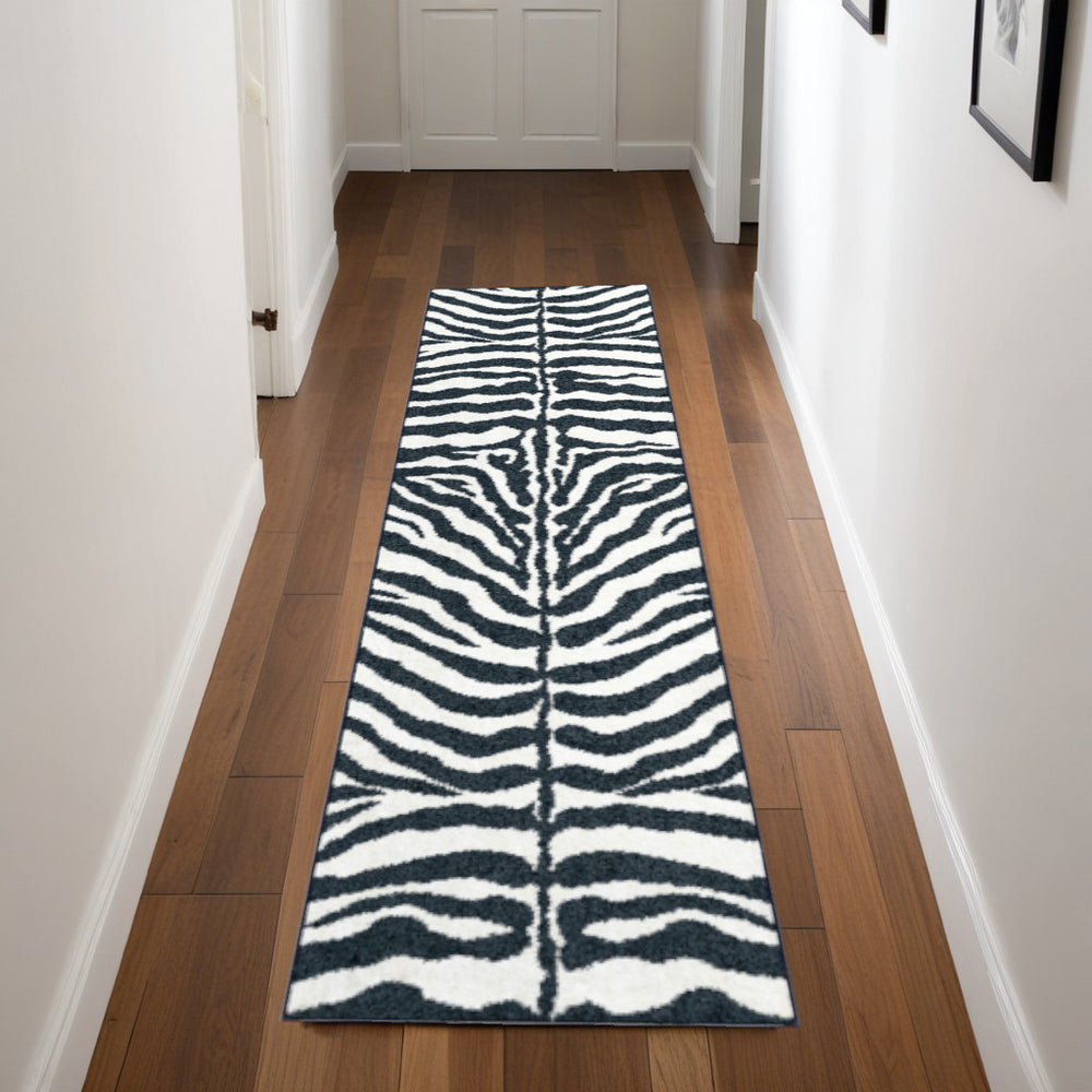 Homeroots 3' X 8' Black And White Zebra Print Shag Handmade Non Skid Runner Rug  Polyester 491638