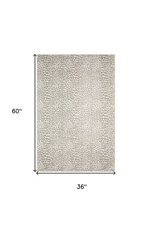 Homeroots 3' X 5' Beige And Cream Leopard  Print Shag Handmade Non Skid Area Rug  Polyester 491675