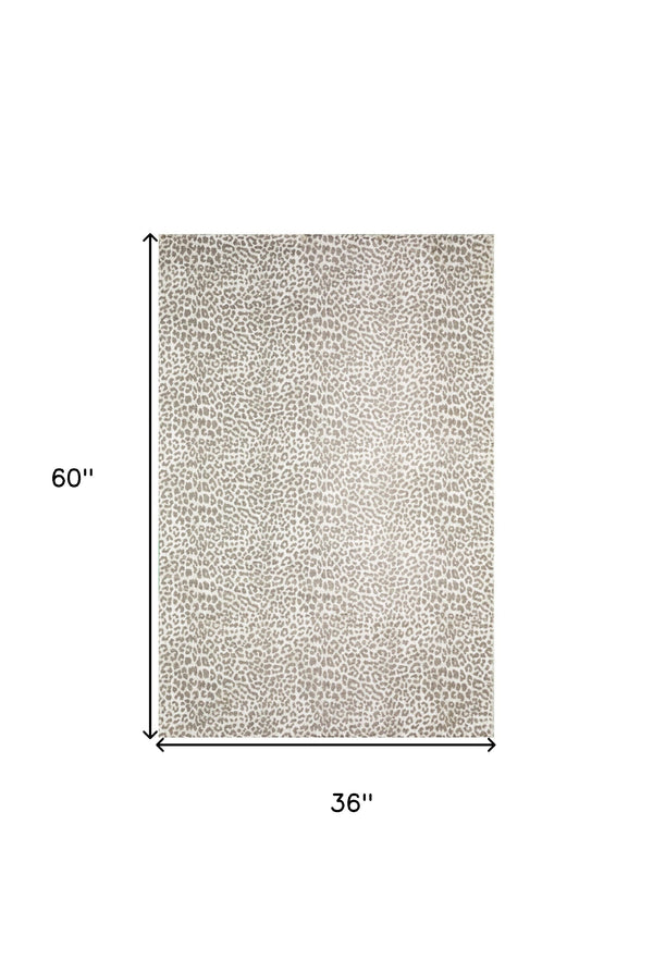 Homeroots 3' X 5' Beige And Cream Leopard  Print Shag Handmade Non Skid Area Rug  Polyester 491675