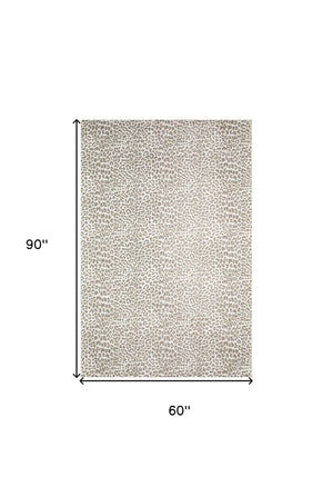 Homeroots 5' X 8' Beige And Cream Leopard  Print Shag Handmade Non Skid Area Rug  Polyester 491676