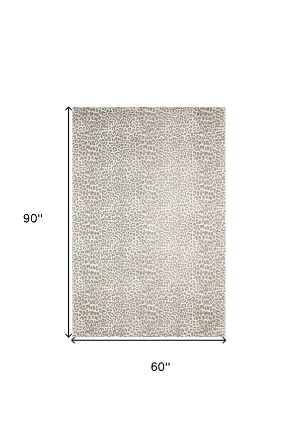 Homeroots 5' X 8' Beige And Cream Leopard  Print Shag Handmade Non Skid Area Rug  Polyester 491676