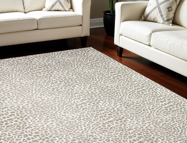 Homeroots 8' X 10' Beige And Cream Leopard  Print Shag Handmade Non Skid Area Rug  Polyester 491677