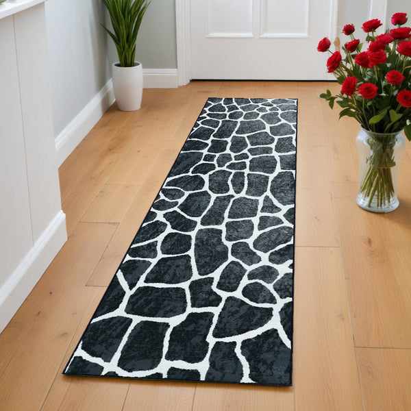 Homeroots 2' X 8' Black And White Croc Print Shag Handmade Non Skid Runner Rug  Polyester 491716