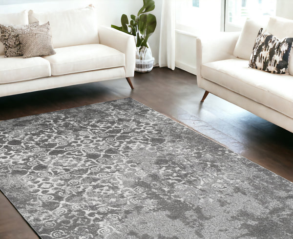 Homeroots 10' X 13' Gray And Ivory Oriental Distressed Area Rug  Polypropylene 491938