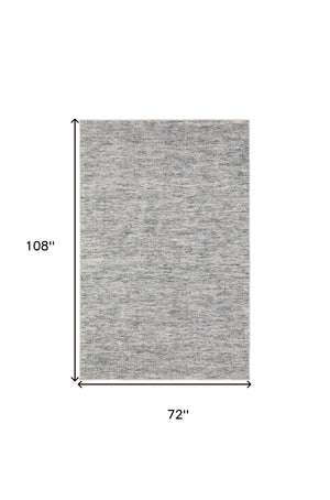 Homeroots 6' X 9' Blue Wool Hand Loomed Handmade Area Rug  Wool 493211