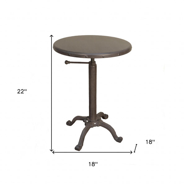 HomeRoots 22" Industrial Round End Table - Sturdy Gunmetal Iron with Riveted Details, Perfect for Small Spaces 493235