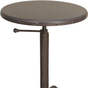 HomeRoots 22" Industrial Round End Table - Sturdy Gunmetal Iron with Riveted Details, Perfect for Small Spaces 493235