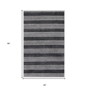 HomeRoots 5' Hand Loomed Black and White Striped Area Rug – Artisan Crafted Softness for Modern Spaces 493264