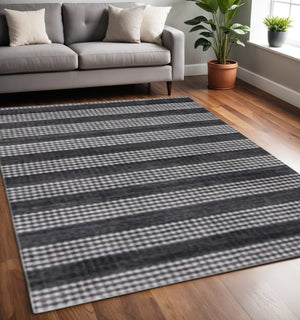 HomeRoots 5' Hand Loomed Black and White Striped Area Rug – Artisan Crafted Softness for Modern Spaces 493264