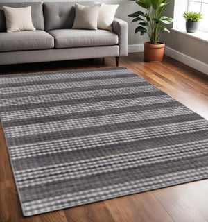 HomeRoots 5' X 8' Hand-Loomed Dark Grey and White Striped Area Rug - Artisan Crafted for Modern Elegance 493273