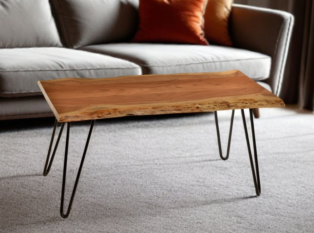 HomeRoots 42" Natural and Black Solid Wood Coffee Table with Iron Base - Rustic Chic Centerpiece for Any Room 493316