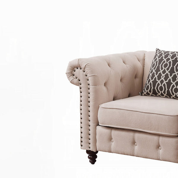 English Elm Beige Tufted Accent Chair with Pillow alternative: Beige Tufted Accent Chair with Pillow is not allowed. Need new title. B062P209144