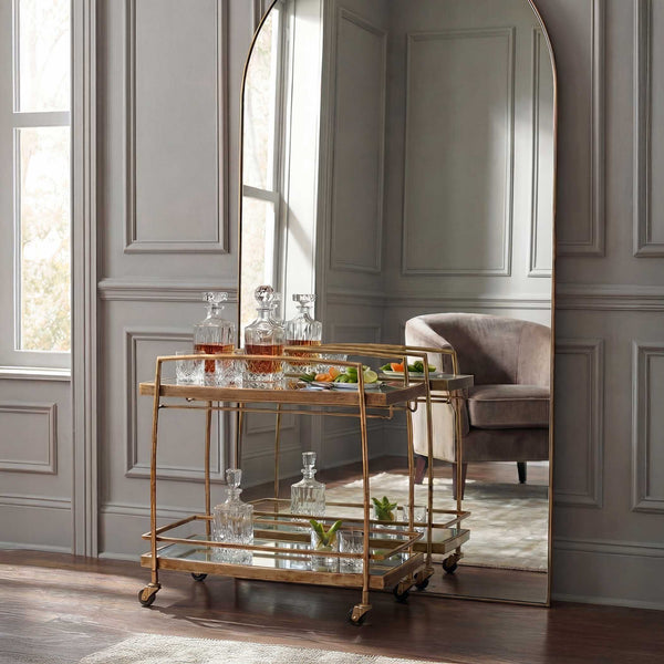 Uttermost Scarritt Two Shelf Glass and Iron Bar Cart with Rolling Casters Antique Brass