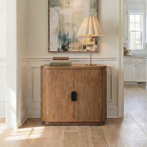 Uttermost Newell Mindi Wood Accent Cabinet with Curved Silhouette and Bronze Pull